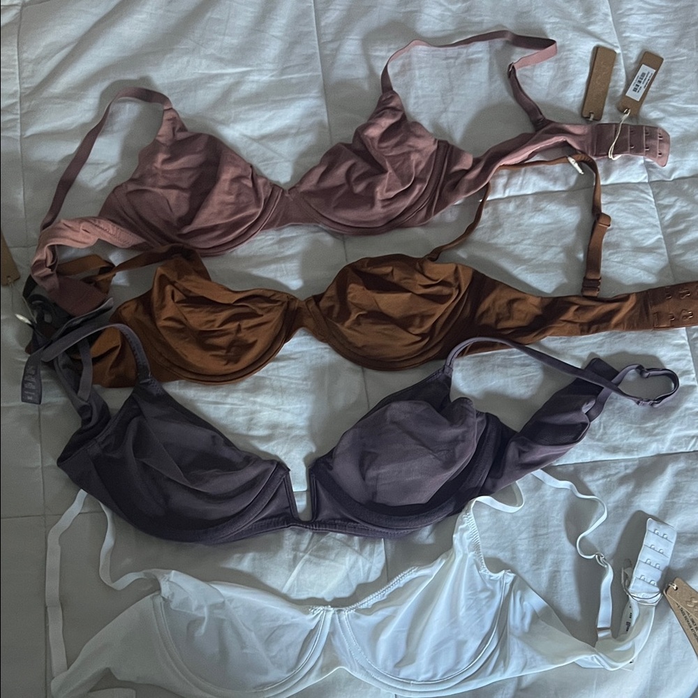 SKIMS Underwire Bra Set in copper, marble, plum and rose clay